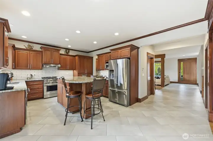 Heated flooring in main entry and kitchen.