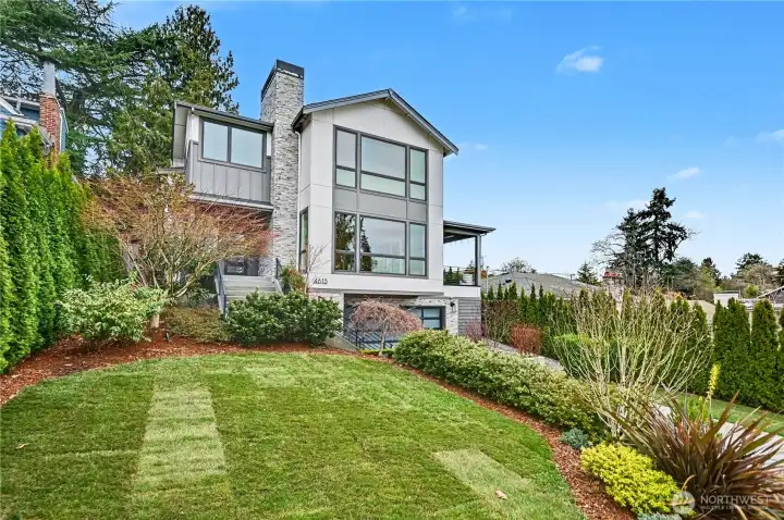 Masterfully designed by McCullough Architects to capture sweeping views of Lake Washington and Andrews Bay.