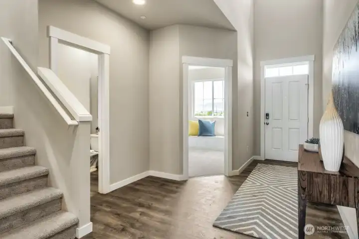 As you enter the front door, we have a private den/ home office and 1/2 bathroom away from the kitchen and family room. Photos are for representational purposes only.  Colors and finishes may vary.