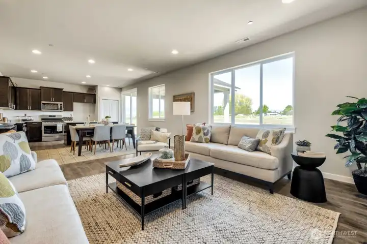 Open great room concept next to your kitchen. Photos are for representational purposes only.  Colors and finishes may vary.