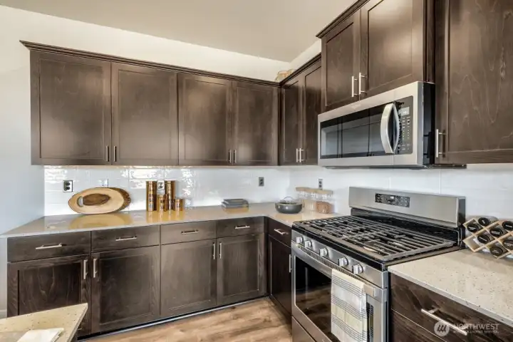 White cabinets will be included in the actual home. Photos are for representational purposes only.  Colors and finishes may vary.