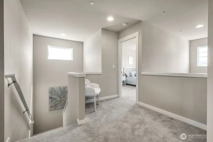 The entryway has a 2-story vault ceiling with window to bring in tons of light. Photos are for representational purposes only.  Colors and finishes may vary.