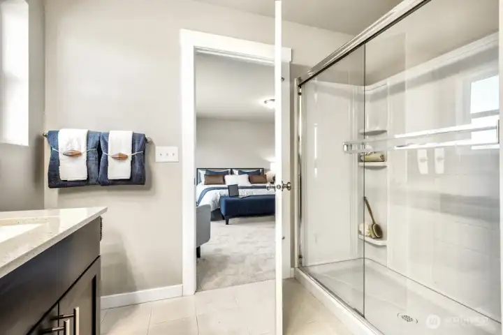 Bath off the primary suite. Photos are for representational purposes only.  Colors and finishes may vary.