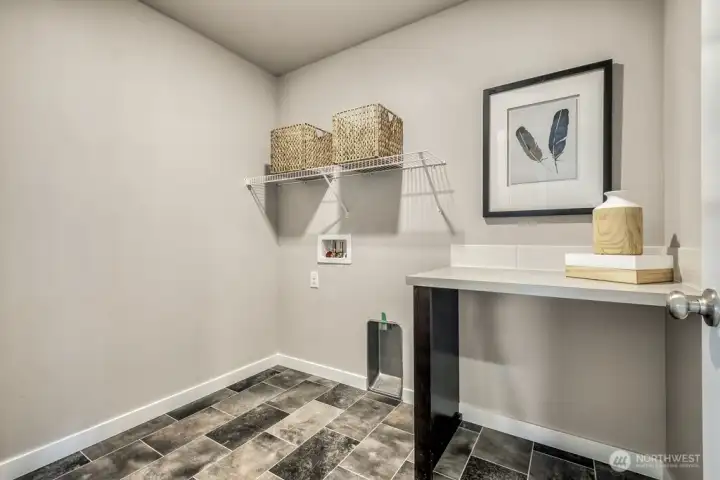 Laundry room conveniently located upstairs near bedrooms and bath! Photos are for representational purposes only.  Colors and finishes may vary.