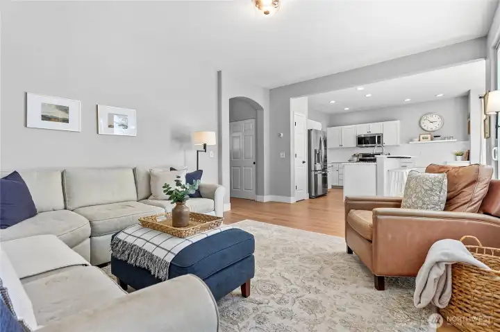 Living room right off kitchen overlooking the backyard