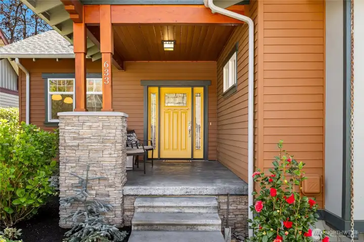 The covered front porch is welcoming and spacious.  It also makes a great spot to sit and relax at the end of the day.