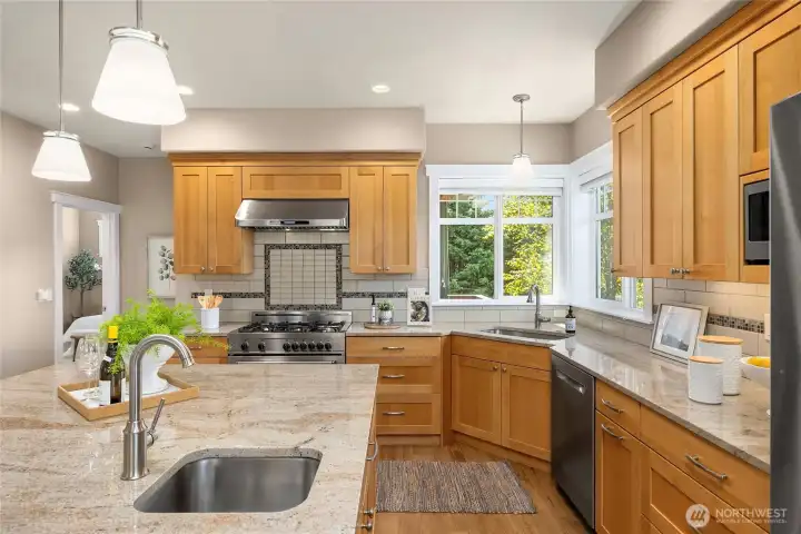 Lots of counter space at the kitchen island, which includes a convenient prep sink.