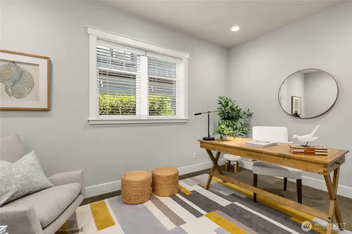 This room at the end of the hall on main level makes a great spot for a home office or hobby/craft room.