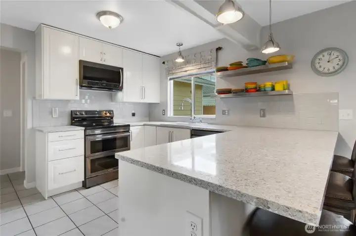 Custom cabinets and quartz countertops ..