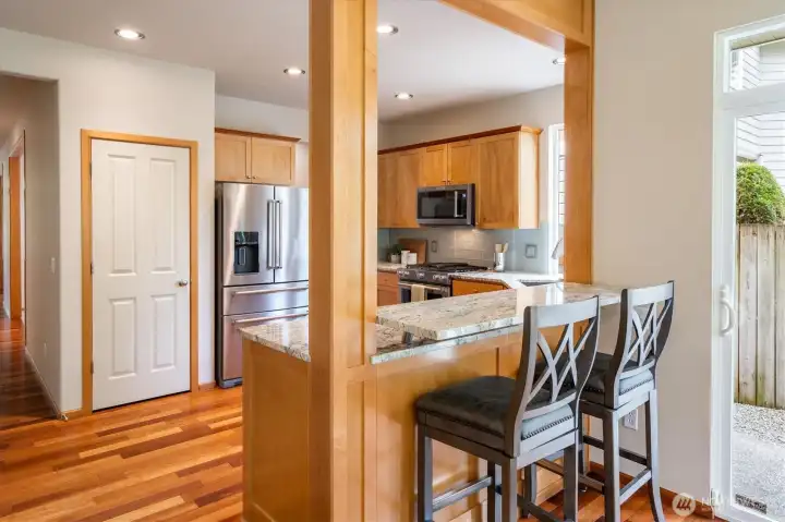 Walk in pantry to the left of fridge and kitchen with eating space Walk in pantry to the left of fridge and kitchen with eating space
