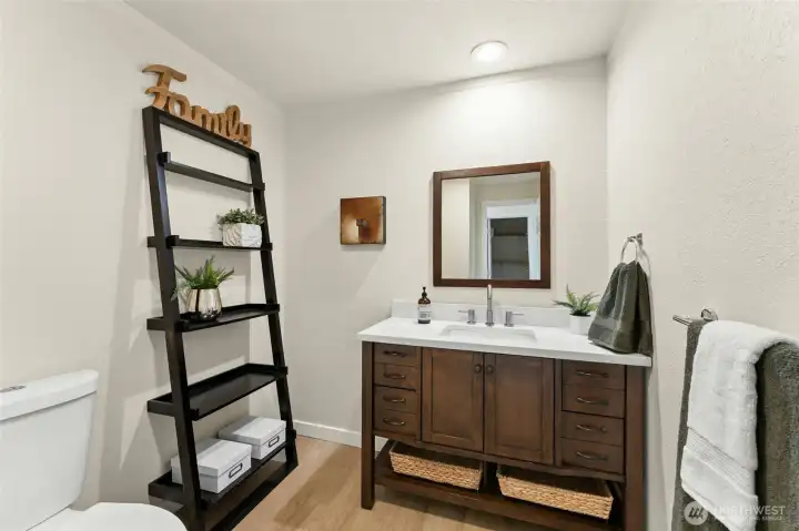 Spacious updated half bath Spacious updated half bath