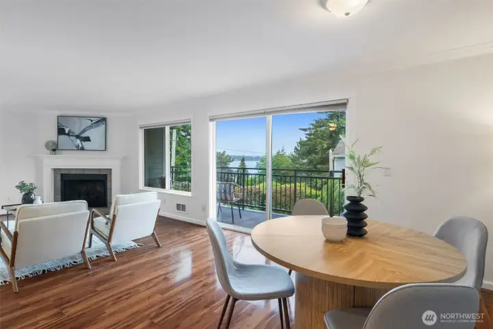 Open-concept floor plan featuring a spacious dining area that flows seamlessly from the kitchen into the living room, creating an ideal environment for entertaining and daily living. And the views...