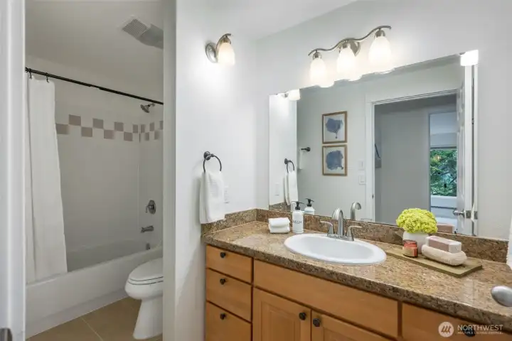 Full bathroom featuring a double vanity sink