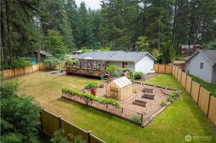 Gardeners Delight in this spacious level lot residence