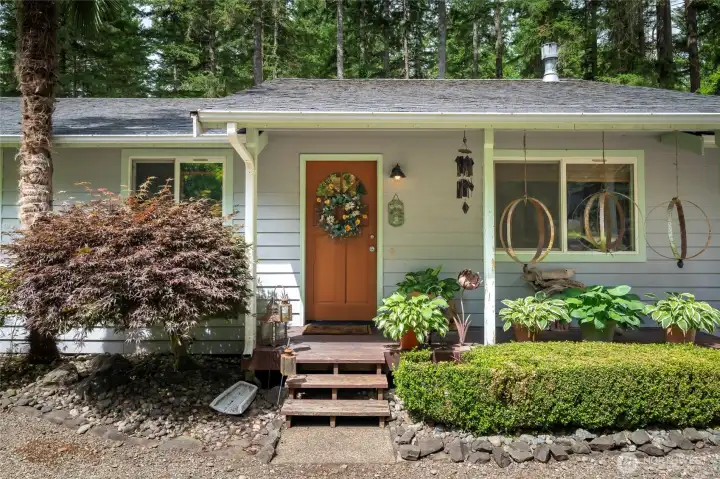 A warm welcome home in the gated Lake Holiday community.