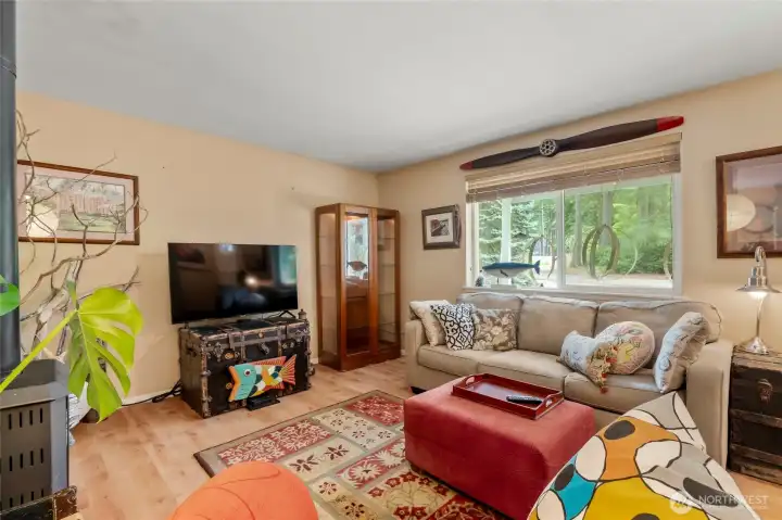 Cozy up by the fireplace after a day spent enjoying the lake and outdoors.