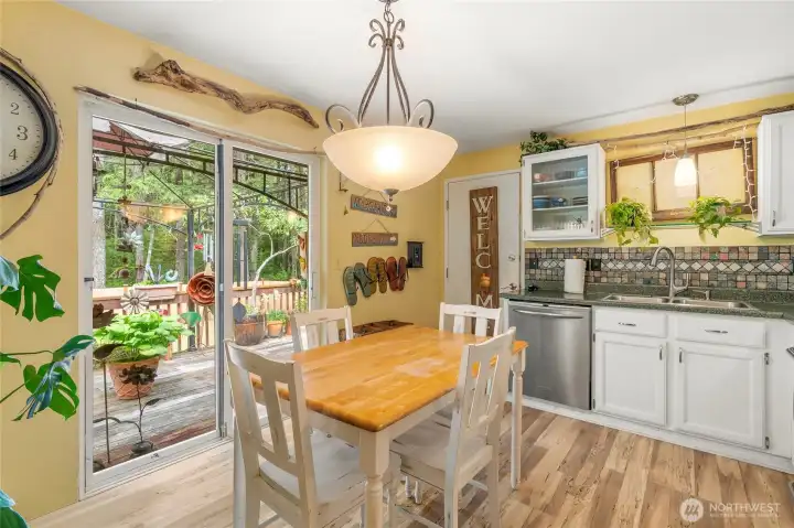 Indoor-outdoor living flows naturally from the dining area to the backyard.
