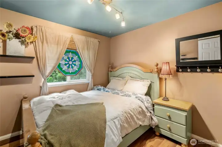Comfortable bedroom spaces offer flexibility for guests, work, or hobbies.