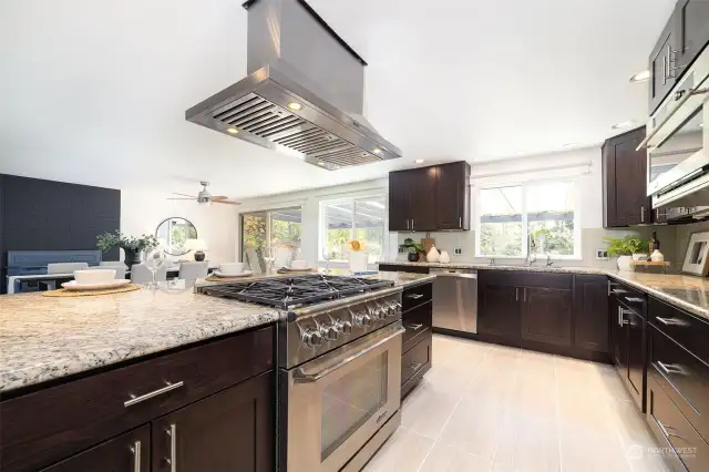 Chef’s kitchen with high end Stainless Steel appliances, including a Décor gas stove.