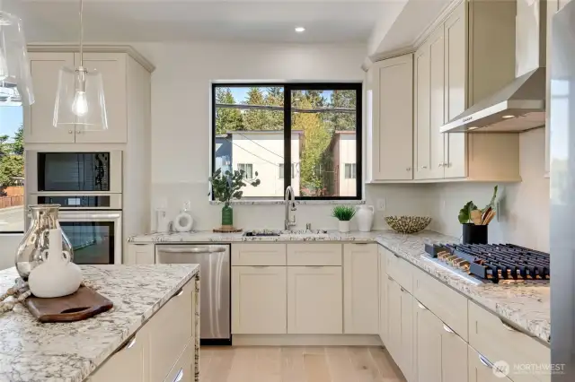 Gleaming granite counters, stainless appliances and tons of cabinets and counter space.