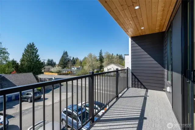Large covered balcony to enjoy the neighborhood sounds with your morning coffee.