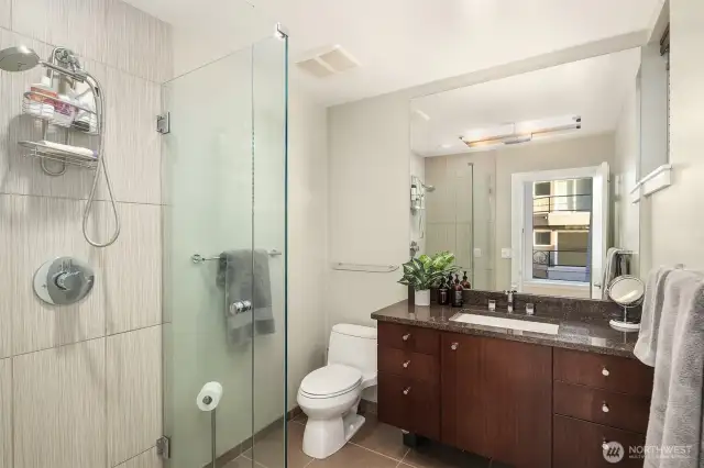 Rich bathroom adjacent to lower level bedroom.