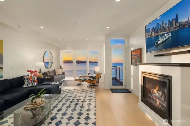 Floor-to-ceiling glass marries the outside splendor with the rich finishes that define this landmark offering.