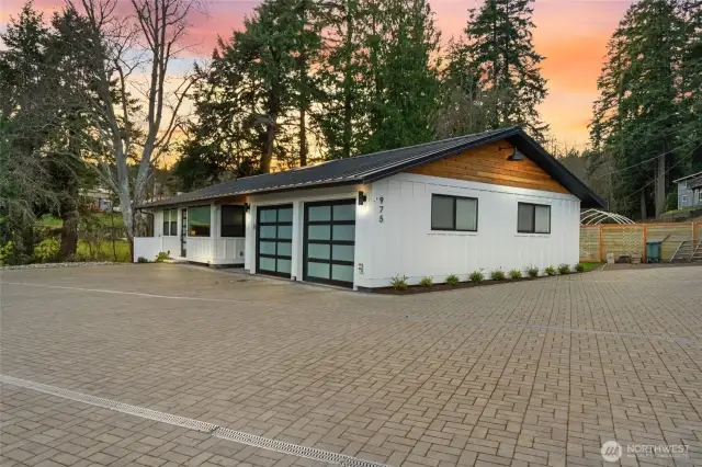 The second home has water views as well, along with a level backyard with sprinkler system and fence.