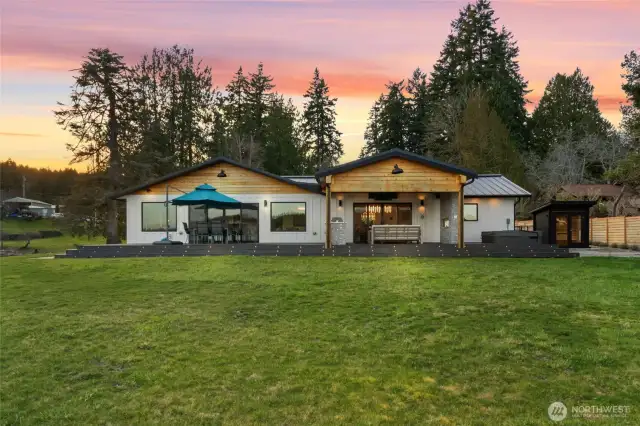 The sunsets and sunrises on this property will inspire you on a daily basis. Plenty of yard space on both the back and side of the home for endless enjoyment.