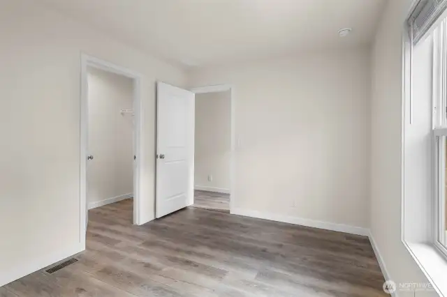 Spacious bedroom with walk-in closet
