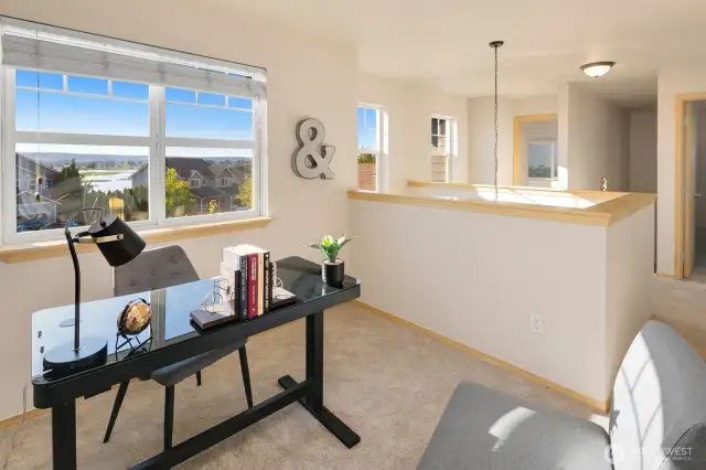 Enjoy the water and Mtn views from this flex room.