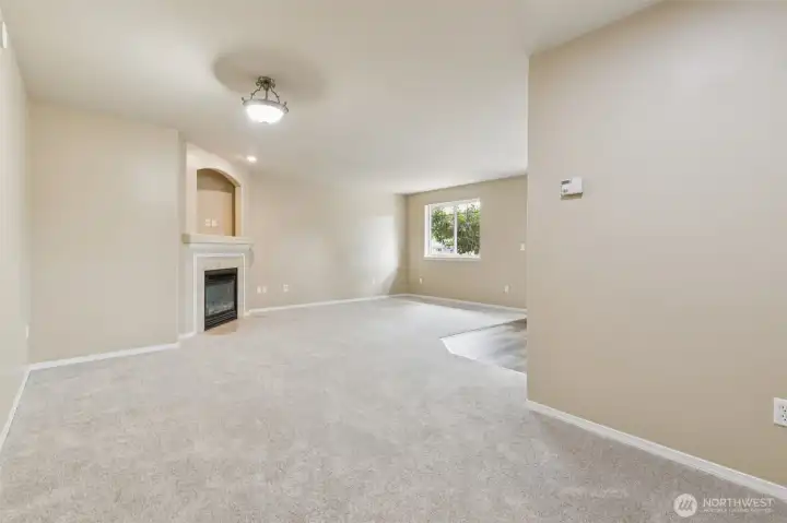 Entering the living area from the front door and hallway
