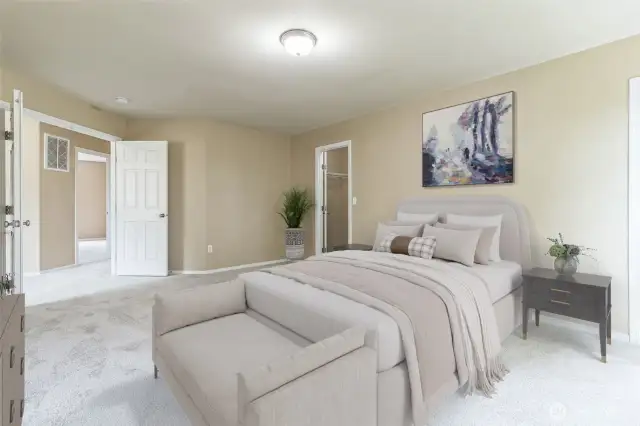 Primary with French doors, walk-in closet, and full bath. Virtually staged.
