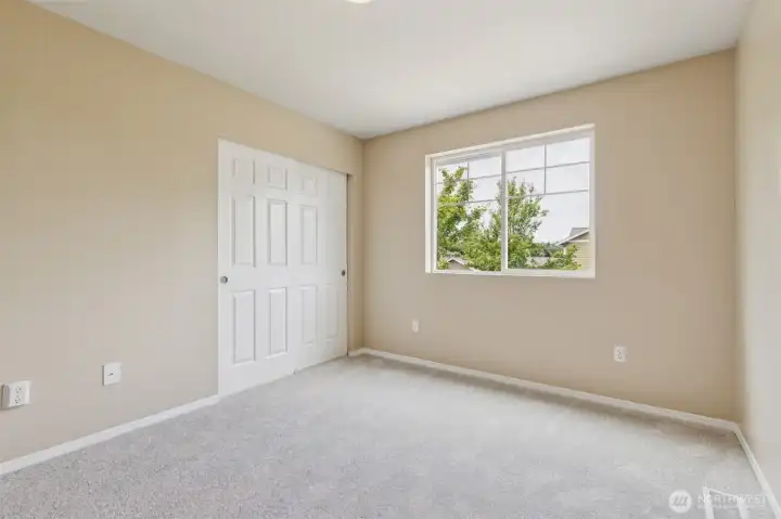 Guest bedroom 2, with new carpet, padding, and paint