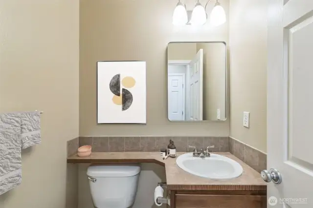 Main level guest bath. Virtually staged.