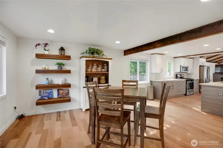 Sweet dining room with plenty of space for an even larger table.