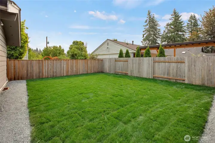 Fabulous back yard is totally flat and has brand new sod!
