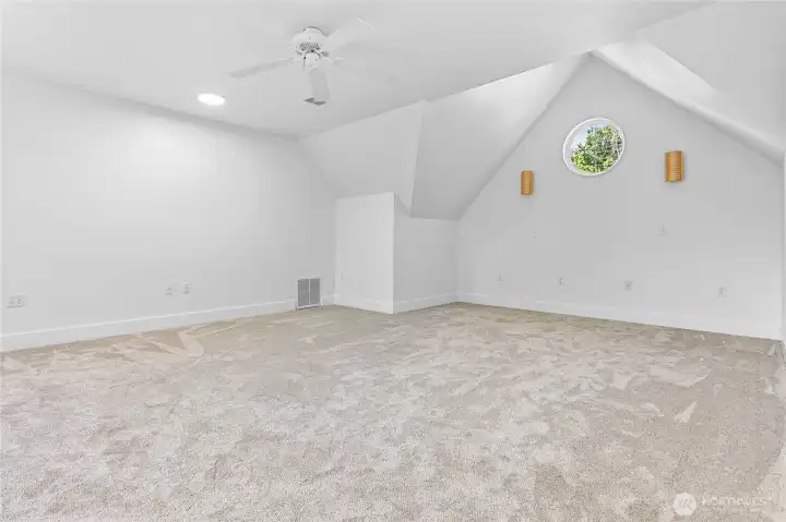 The pictures don't do this room justice. It's HUGE and could be used as a second living room, additional bedroom, limitless potential.