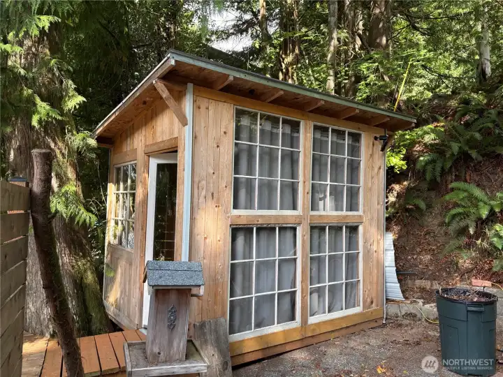 Outbuilding can be used for storage or made into additional living space for guests.
