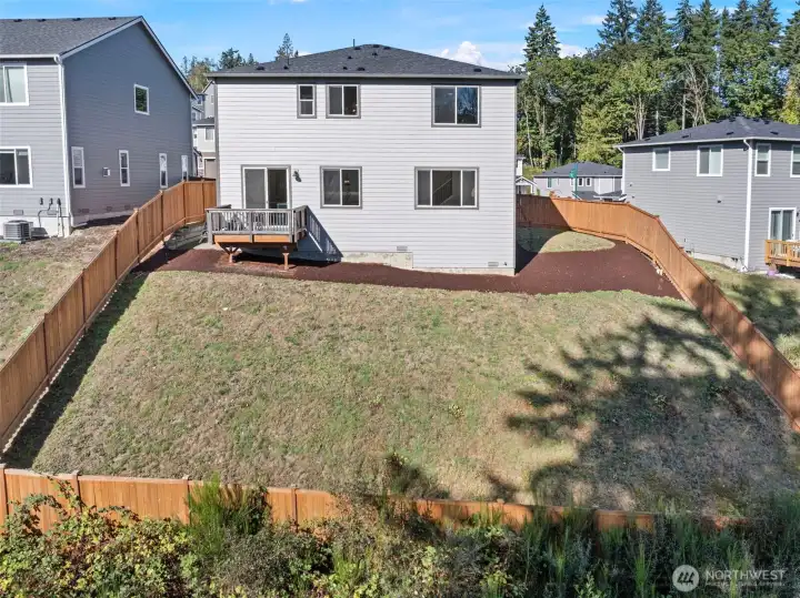 Rear Elevation and fenced backyard