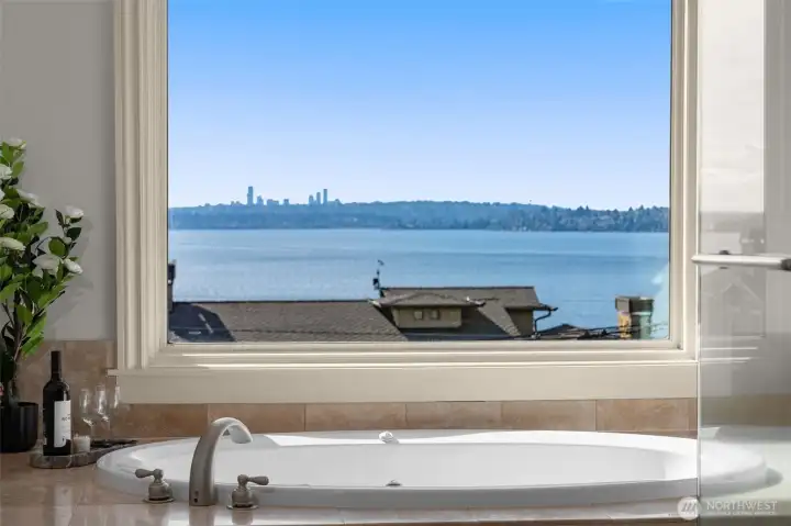 Light on the water improves your mood.  Views of the water from the soakin hot jetted tub in the primary suite will make you feel very special indeed!