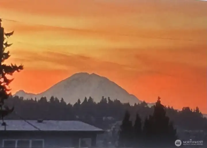 A stunner of a sunset surrounds Mt. Rainier.