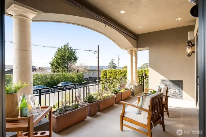 View Balcony with fireplace from main floor.