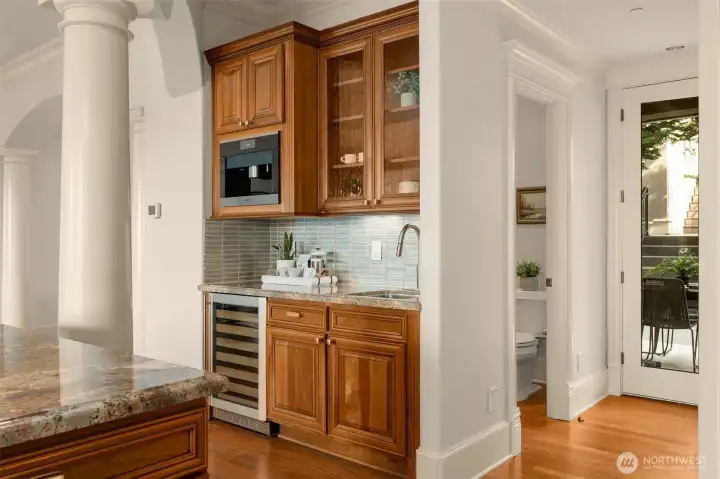 Wet bar at Kitchen with wine cooler and built-in espresso machine!