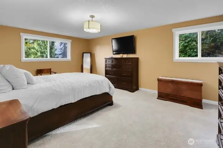 The Large Primary bedroom has new carpet and the windows are exceptionally private