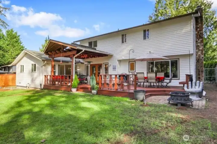 Fire pit, garden beds, spacious deck what else could you need!