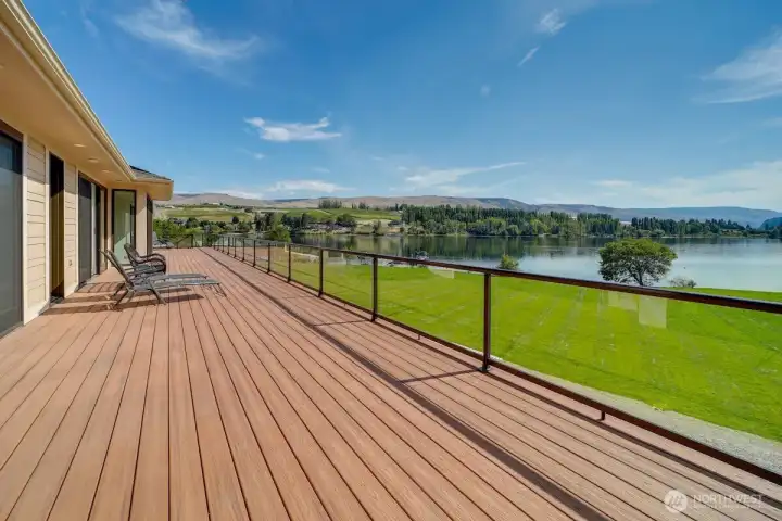 Expansive trex deck with sliding door access from each suite