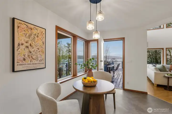Large eating nook in kitchen...with VIEWS and access to deck!