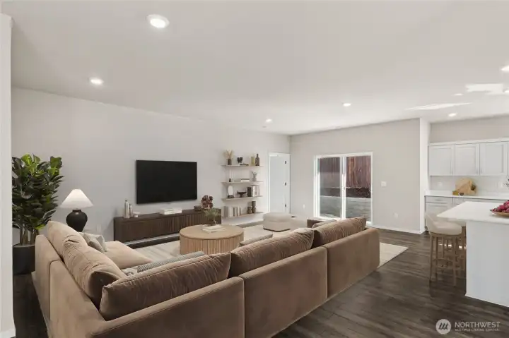 Living room with access to back patio. *Finishes and options will vary.
