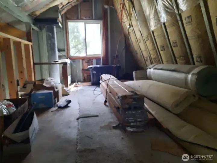 Spacious loft with building materials